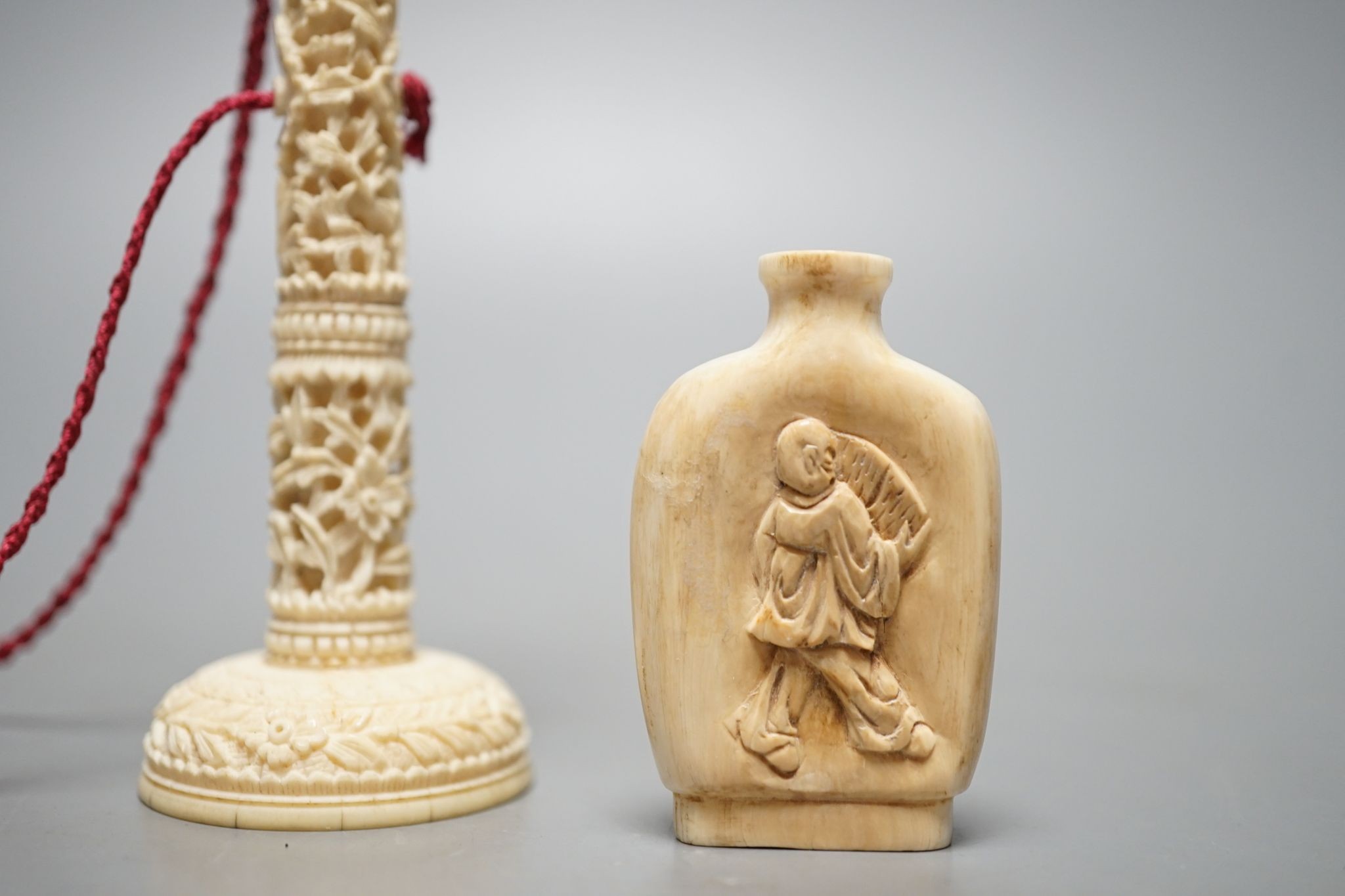 A Chinese export ivory spike and ball game, 16.5cm, and an ivory snuff bottle
